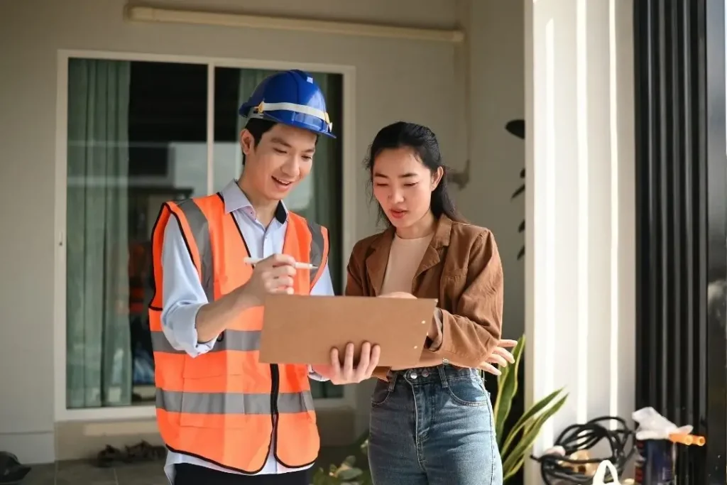 homeowner discussing with a contractor