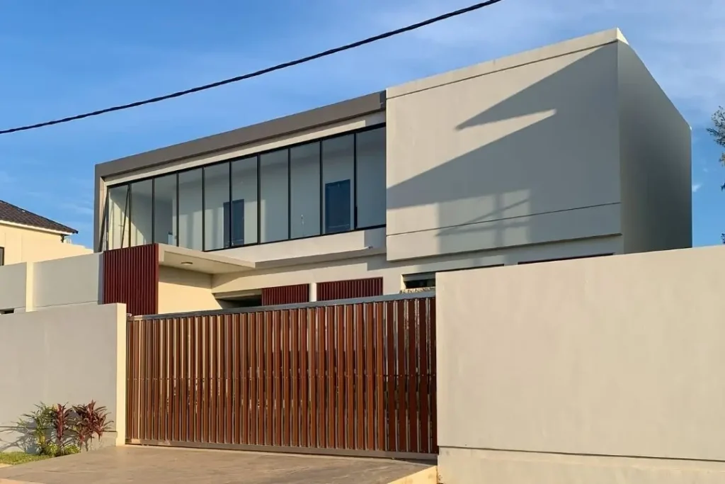 house with timber sliding gate